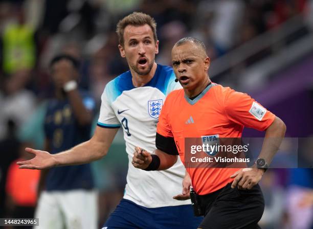 Harry Kane of England complains to referee Wilton Pereira Sampaio during the FIFA World Cup Qatar 2022 quarter final match between England and France...