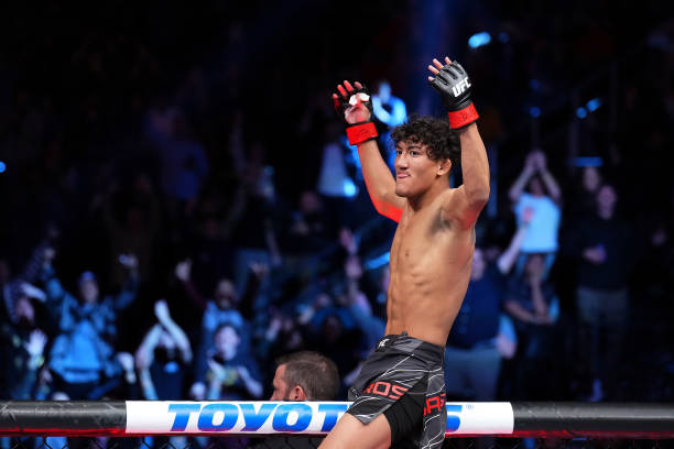 Raul Rosas Jr. Reacts after defeating Jay Perrin in a featherweight fight during the UFC 282 event at T-Mobile Arena on December 10, 2022 in Las...
