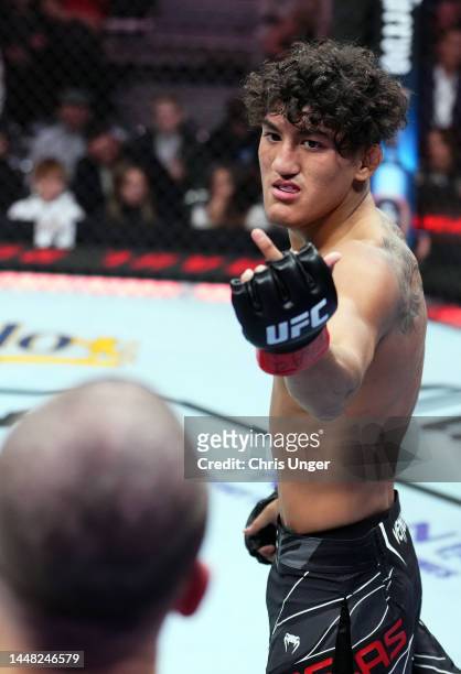 Raul Rosas Jr. Reacts to Jay Perrin in a featherweight fight during the UFC 282 event at T-Mobile Arena on December 10, 2022 in Las Vegas, Nevada.