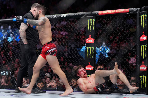 Ilia Topuria reacts after defeating Bryce Mitchell by submission during the UFC 282 event at T-Mobile Arena on December 10, 2022 in Las Vegas, Nevada.