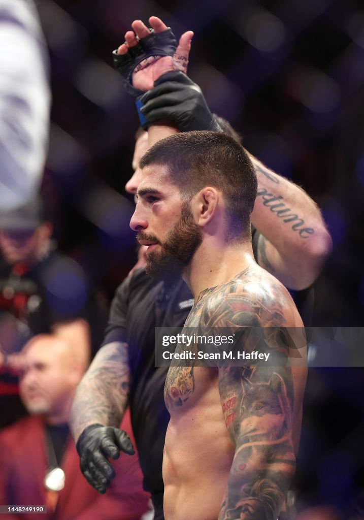 Ilia Topuria reacts after defeating Bryce Mitchell in a