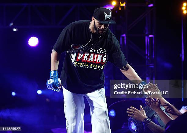 Mike Kyle walks towards the cage before his fight with Rafael Cavalcante during the Strikeforce event at HP Pavilion on May 19, 2012 in San Jose,...