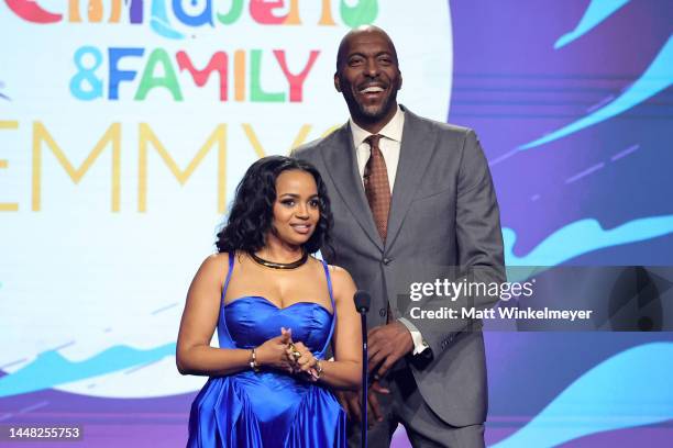 Kyla Pratt and John Salley speak onstage during the 2022 Children's & Family Creative Arts Emmys at Wilshire Ebell Theatre on December 10, 2022 in...