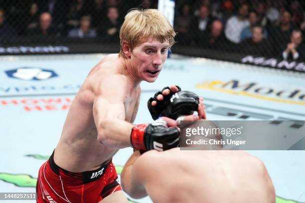 Paddy Pimblett of England punches Jared Gordon in a lightweight fight during the UFC 282 event at T-Mobile Arena on December 10, 2022 in Las Vegas,...