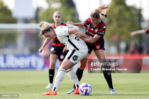 Jenna McCormick of Adelaide competes with Isabella Habuda of the Wanderers during the round four A-League Women's match between Western Sydney...