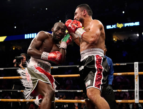 Champion Terence Crawford and David Avanesyan trade punches during their welterweight title fight at CHI Health Center on December 10, 2022 in Omaha,...