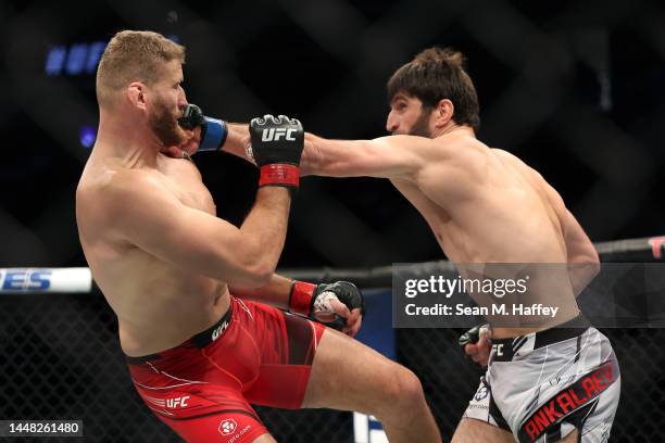 Magomed Ankalaev of Russia punches Jan Blachowicz of Poland in their UFC light heavyweight championship fight during the UFC 282 event at T-Mobile...