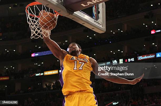 Andrew Bynum of the Los Angeles Lakers dunks the ball in the second quarter while taking on the Oklahoma City Thunder in Game Four of the Western...