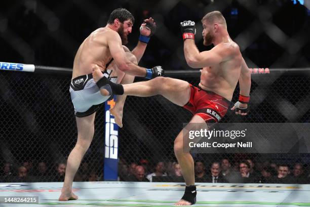 Jan Blachowicz of Poland kicks Magomed Ankalaev of Russia in their UFC light heavyweight championship fight during the UFC 282 event at T-Mobile...