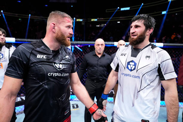 Jan Blachowicz of Poland and Magomed Ankalaev of Russia react after their UFC light heavyweight championship fight resulted in a split draw during...