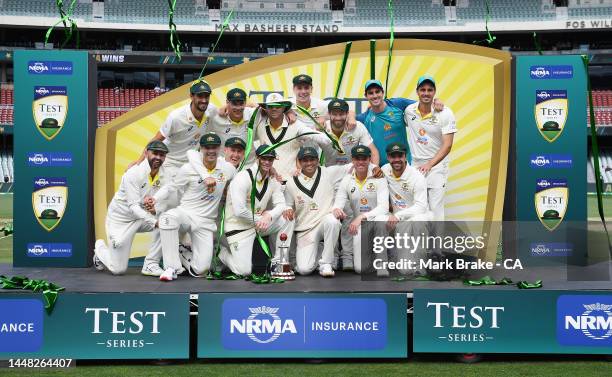 Australia pose with Frank Worrell trophy after winning the Second Test Match in the series between Australia and the West Indies at Adelaide Oval on...