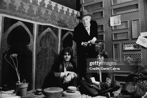 James Fox, photographer Cecil Beaton and Mick Jagger on the set of the crime drama 'Performance', London, 2nd November 1968. Jagger and Fox co-star...