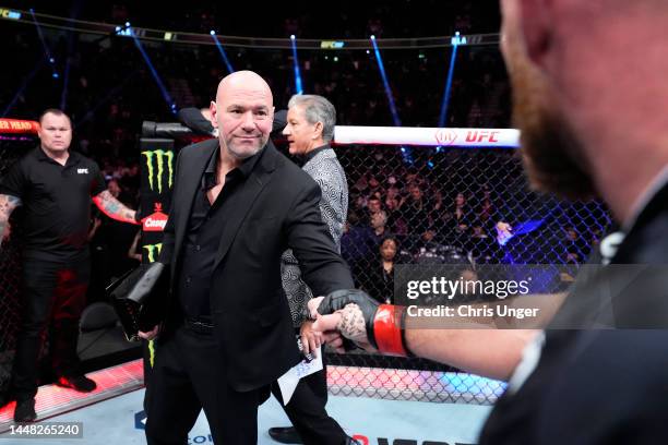 President Dana White interacts with Jan Blachowicz of Poland after his split draw decision against Magomed Ankalaev of Russia in their UFC light...