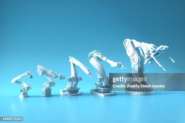 robotic arms evolution - evolução imagens e fotografias de stock