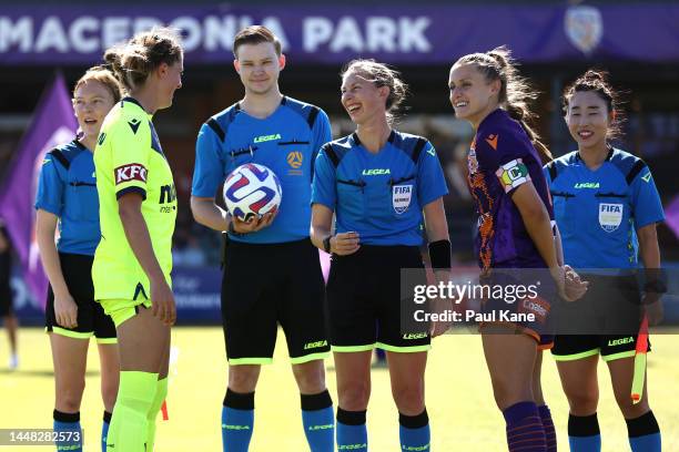 Referee Lana Lee talks with Kayla Morrison of the Victory and Natasha Rigby of the Glory before the coin toss during the round four A-League Women's...