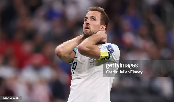 Harry Kane of England looks dejected after their exit from the World Cup during the FIFA World Cup Qatar 2022 quarter final match between England and...