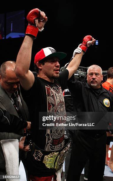 Gilbert Melendez reacts to being declared the winner in his fight against Josh Thomson during the Strikeforce event at HP Pavilion on May 19, 2012 in...