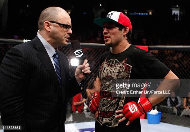 Mauro Ranallo interviews Gilbert Melendez after his win over Josh Thomson during the Strikeforce event at HP Pavilion on May 19, 2012 in San Jose,...