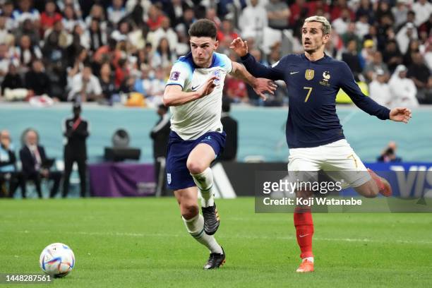 Antoine Griezmann of France and Declan Rice during the FIFA World Cup Qatar 2022 quarter final match between England and France at Al Bayt Stadium on...