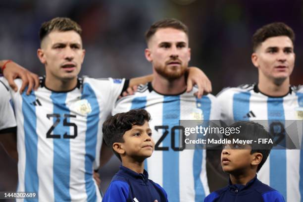 Player escorts look on during the Argentina national anthem during the FIFA World Cup Qatar 2022 quarter final match between Netherlands and...