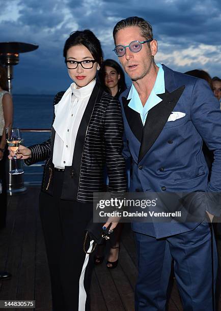Actress Juju Zhu Zhu and Lapo Elkann attend the Vanity Fair and Gucci Party at Hotel Du Cap during 65th Annual Cannes Film Festival on May 19, 2012...