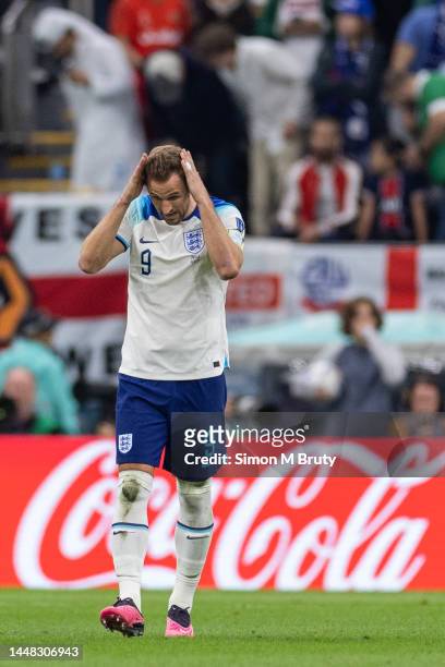 Harry Kane of England reacts after missing a penalty during the FIFA World Cup Qatar 2022 quarter final match between England and France at Al Bayt...