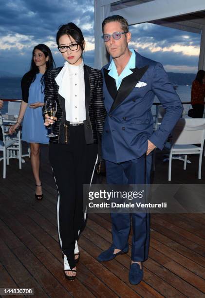 Actress Juju Zhu Zhu and Lapo Elkann attend the Vanity Fair and Gucci Party at Hotel Du Cap during 65th Annual Cannes Film Festival on May 19, 2012...