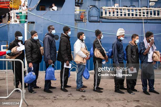 Migrants during the disembarking operations from the ship Geo Barents on December 11, 2022 in Salerno, Italy. 248 migrants rescued by the Geo Barents...