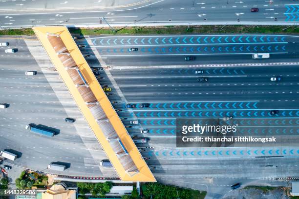 aerial view of toll on highway road - toll stock pictures, royalty-free photos & images