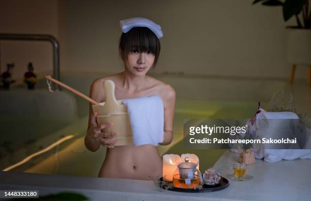 onsen feel - japanese women bath stock pictures, royalty-free photos & images