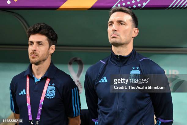 Lionel Scaloni, Head Coach of Argentina, and assistant coach Pablo Aimar are seen prior to the FIFA World Cup Qatar 2022 quarter final match between...