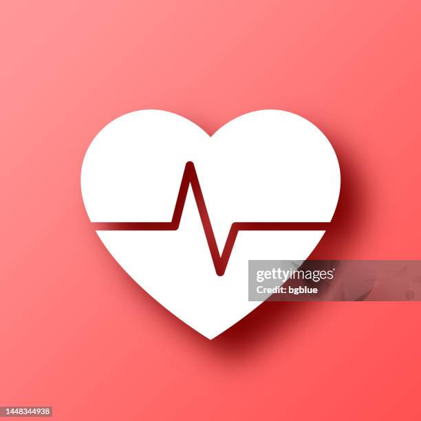 heartbeat - heart pulse. icon on red background with shadow - defibrillator stock illustrations