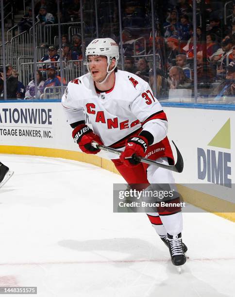 Andrei Svechnikov of the Carolina Hurricanes skates against the New York Islanders at the UBS Arena on December 10, 2022 in Elmont, New York.