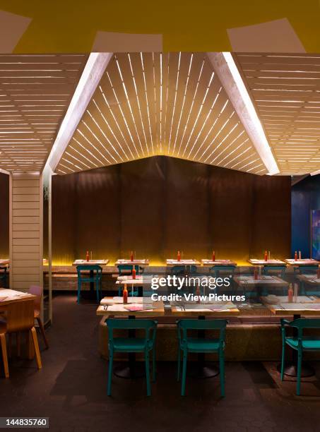 Wahaca, Canada Square, London, E14, United Kingdom, Architect: Softroom Wahaca Restaurant, Softroom, London View Of Restaurant With Tables And Chairs