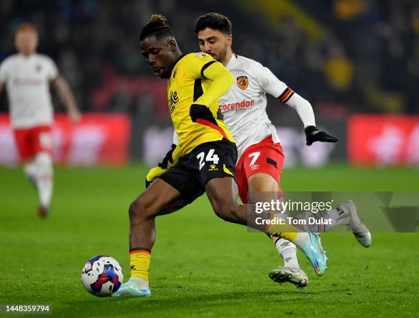 Tom Dele-Bashiru of Watford and Ozan Tufan of Hull City in action during the Sky Bet Championship between Watford and Hull City at Vicarage Road on...