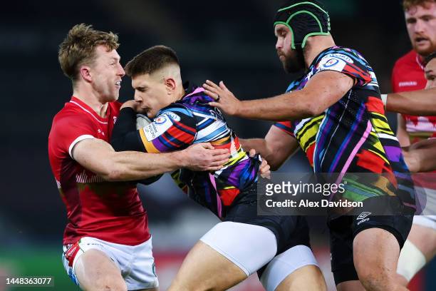 Harry Potter of Leicester Tigers tackles Joe Hawkins of Ospreys during the Heineken Champions Cup Pool B match between Ospreys and Leicester Tigers...
