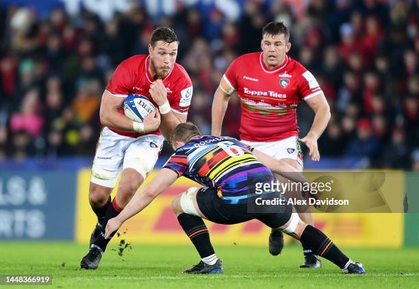 Hanro Liebenberg of Leicester Tigers is challenged by Jac Morgan of Ospreys during the Heineken Champions Cup Pool B match between Ospreys and...