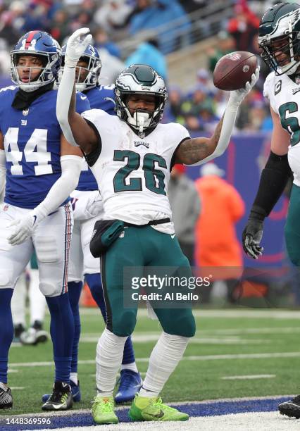 Miles Sanders of the Philadelphia Eagles celebrates after a touchdown during the first quarter of the game against the New York Giants at MetLife...