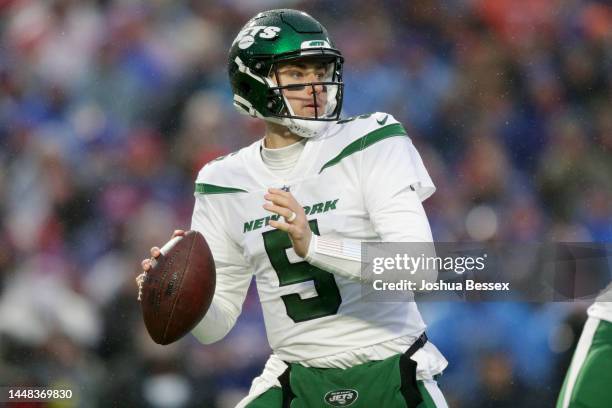 Mike White of the New York Jets looks to pass in the first quarter of a game against the Buffalo Bills at Highmark Stadium on December 11, 2022 in...