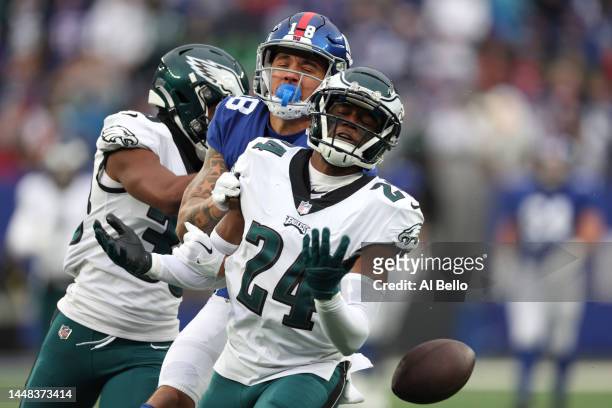 James Bradberry of the Philadelphia Eagles breaks up a pass intended for Isaiah Hodgins of the New York Giants during the first half of the game at...
