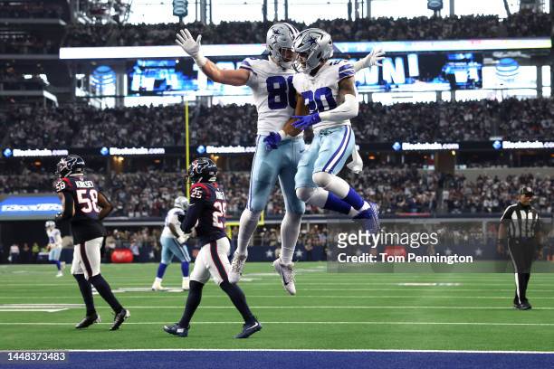 Tony Pollard of the Dallas Cowboys celebrates a touchdown in the second quarter of a game against the Houston Texans at AT&T Stadium on December 11,...