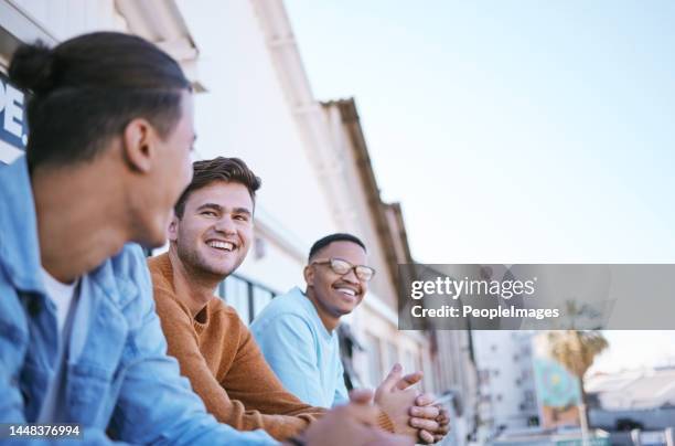 Friends on balcony, London people relax in city summer sunset lifestyle and party joke by funny young man. Happy gen z men bonding by terrace, outdoor apartment weekend and friendship smile together