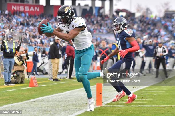 Zay Jones of the Jacksonville Jaguars runs in for a touchdown after the catch in the second quarter of the game against the Tennessee Titans at...