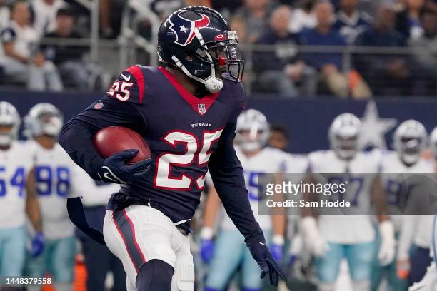 Desmond King II of the Houston Texans runs the ball during the first half against the Dallas Cowboys at AT&T Stadium on December 11, 2022 in...