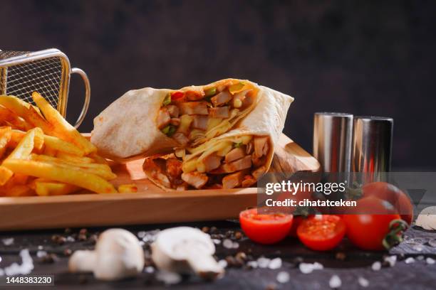 eastern traditional shawarma with sauces - lavash stockfoto's en -beelden