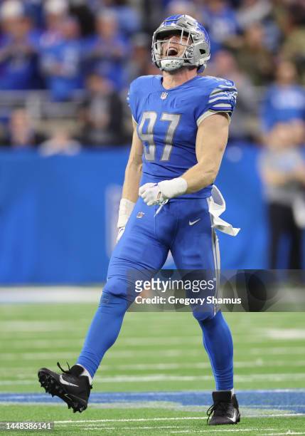 Aidan Hutchinson of the Detroit Lions reacts after a defensive play during the fourth quarter of the game against the Minnesota Vikings at Ford Field...