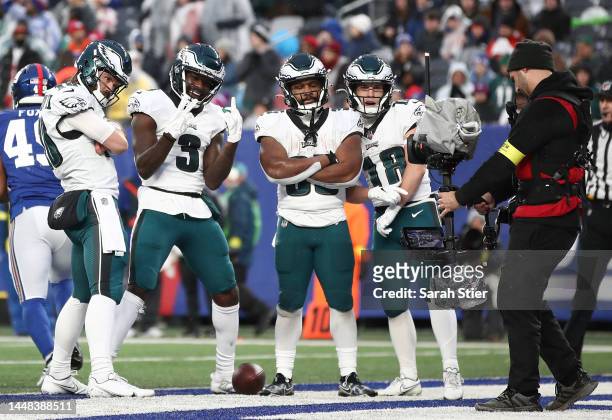 Members of the Philadelphia Eagles celebrate a touchdown in second half of the game against the New York Giants at MetLife Stadium on December 11,...