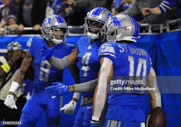 Chark of the Detroit Lions celebrates with his teammates after a touchdown in the second quarter of the game against the Minnesota Vikings at Ford...