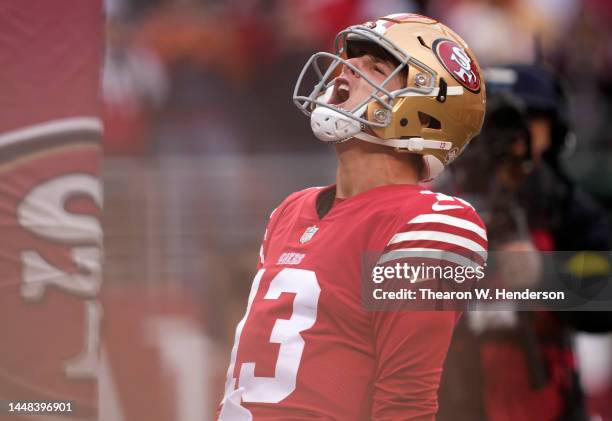 Brock Purdy of the San Francisco 49ers celebrates after scoring a touchdown in the second quarter of the game against the Tampa Bay Buccaneers at...