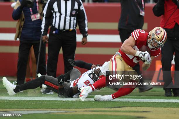Christian McCaffrey of the San Francisco 49ers completes the catch for a touchdown during the first half of the game against the Tampa Bay Buccaneers...